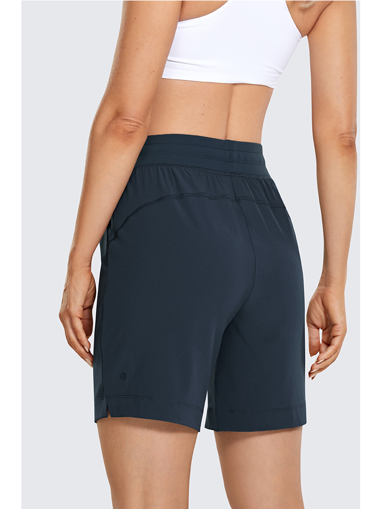 SYROKAN Women's Lightweight Athletic Bermuda Shorts Elastic Waist Workout Walking Shorts with Side Pockets 7 Inches