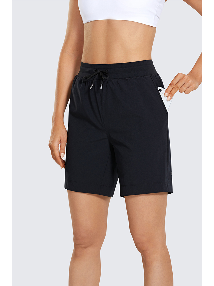 SYROKAN Women's Lightweight Athletic Bermuda Shorts Elastic Waist Workout Walking Shorts with Side Pockets 7 Inches