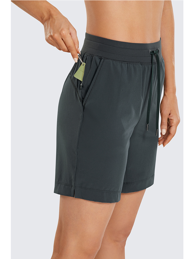 SYROKAN Women's Lightweight Athletic Bermuda Shorts Elastic Waist Workout Walking Shorts with Side Pockets 7 Inches