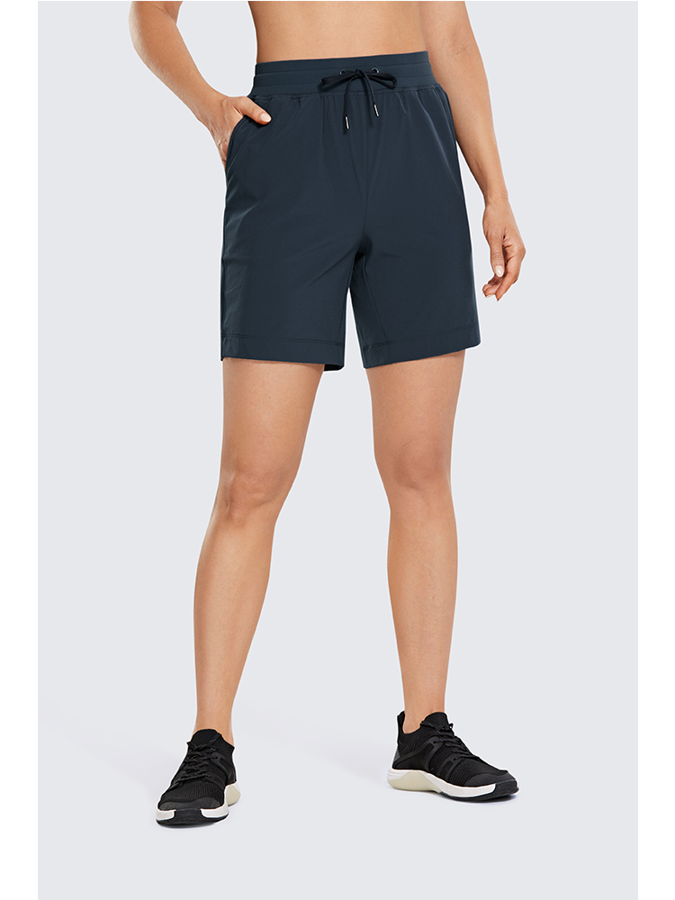 SYROKAN Women's Lightweight Athletic Bermuda Shorts Elastic Waist Workout Walking Shorts with Side Pockets 7 Inches