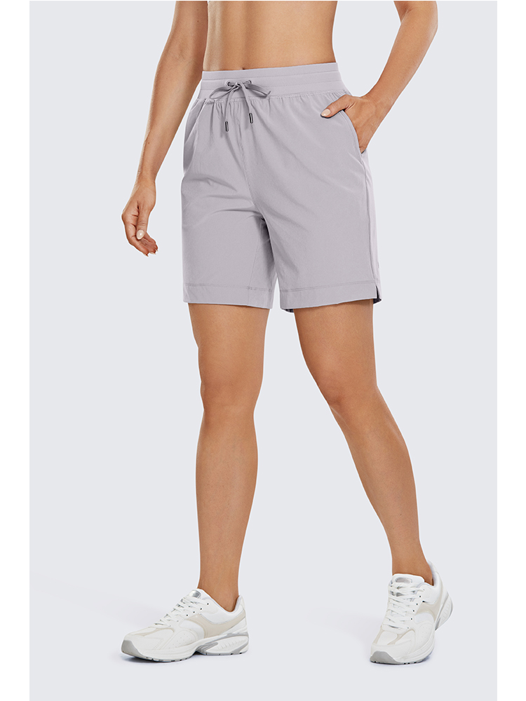 SYROKAN Women's Lightweight Athletic Bermuda Shorts Elastic Waist Workout Walking Shorts with Side Pockets 7 Inches