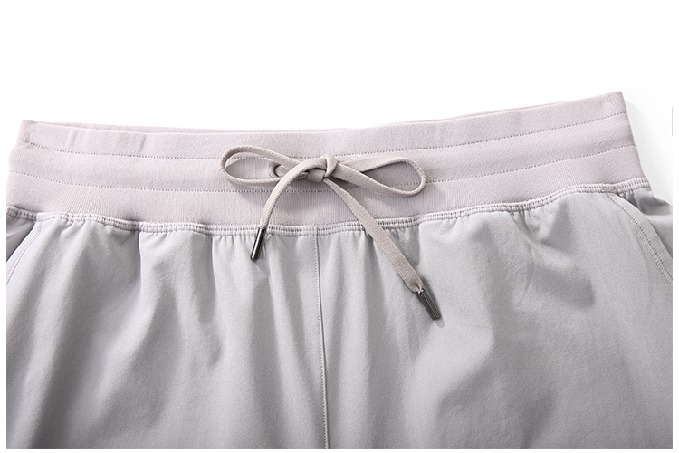 SYROKAN Women's Lightweight Athletic Bermuda Shorts Elastic Waist Workout Walking Shorts with Side Pockets 7 Inches